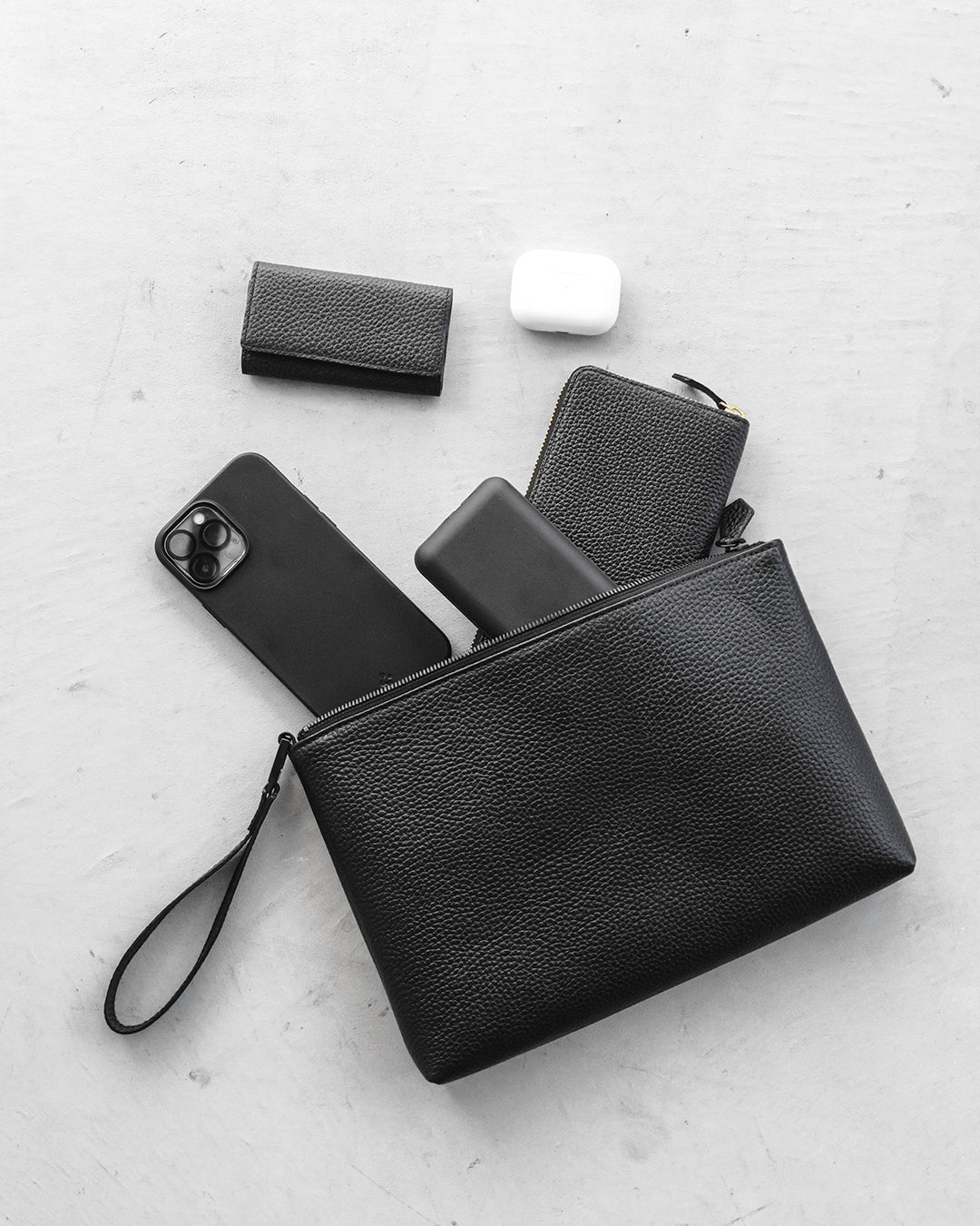 HushTug のマルチケース（クラッチバッグ）